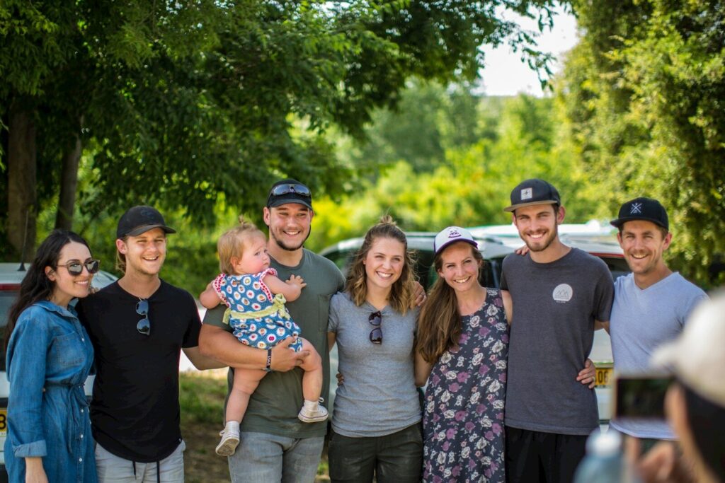 A group of people standing next to each other